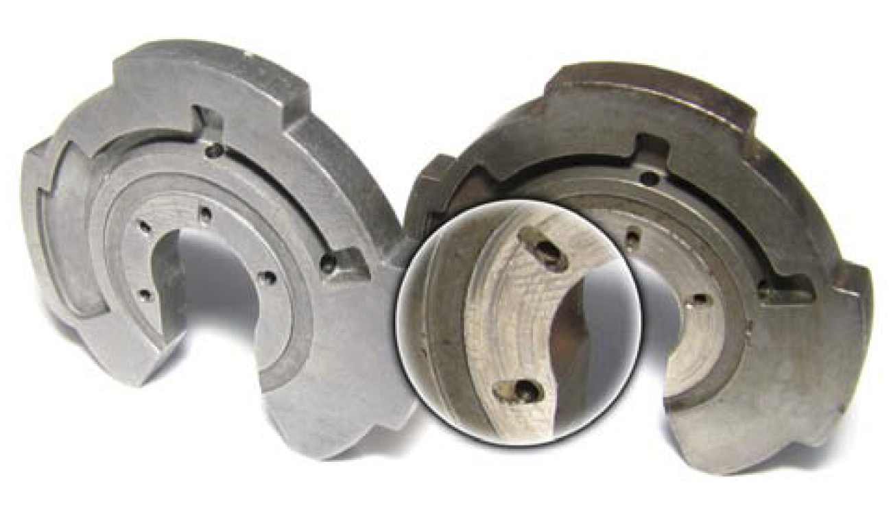 Fig. 9: Thrust Bearing Lack of Lubrication Left = New Bearing; Right = Smooth Wear & Heat Discoloration